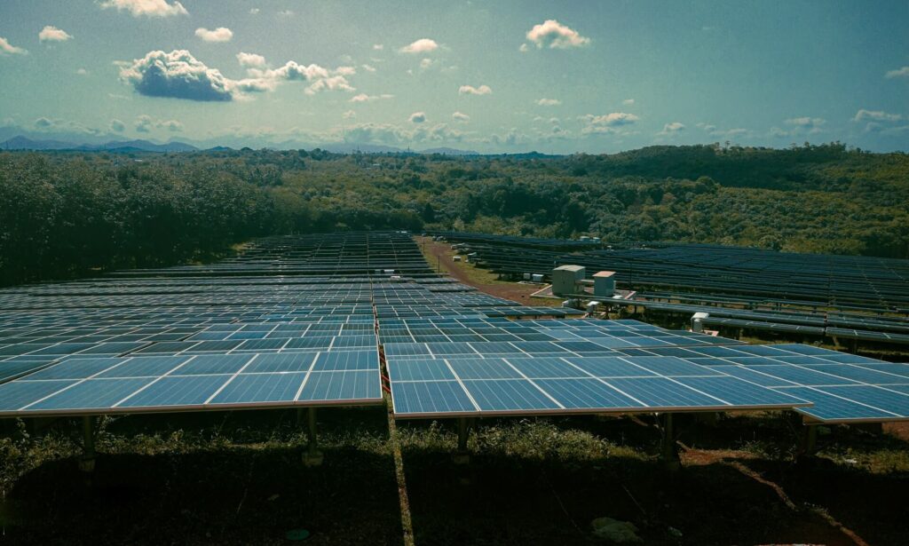 A picture of a Solar Power Plant in a hill.