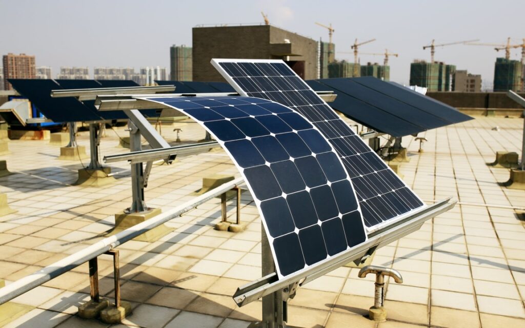 A picture of a thin film solar panel installed on a roof top Solar Power Plant.